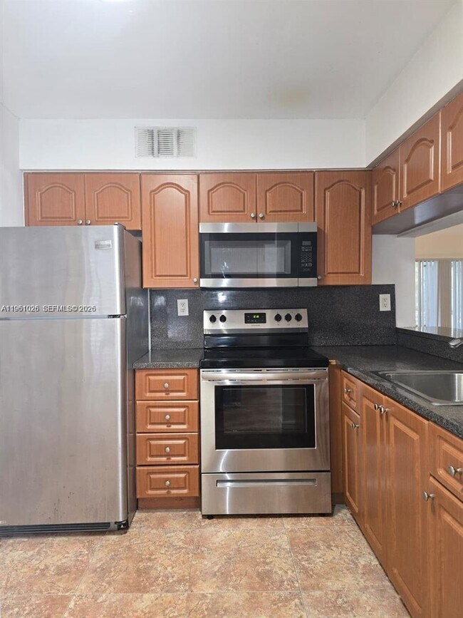 Building Photo - 9501 SW 138th Pl