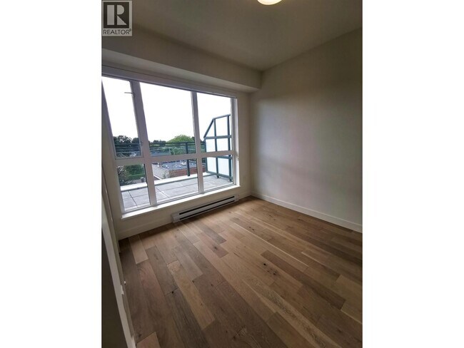 Photo du bâtiment - 209-209 E 20th Ave