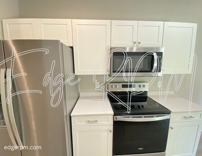 Foto del edificio - NEW Construction Condo