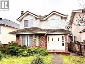 Building Photo - 754 W 69th Ave