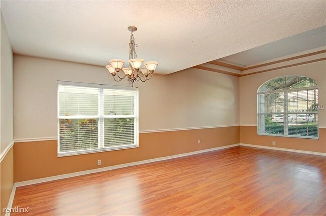 Building Photo - 4 br, 2.5 bath House - 5411 Pine Bay Dr