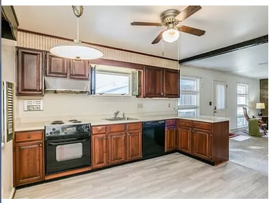 Spacious well lit kitchen with plenty of cabinet space - 1694 E River Rd