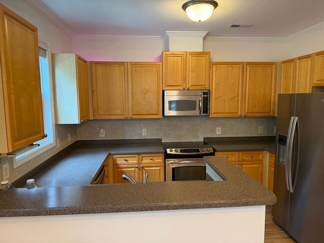 Building Photo - **OFFERING WAIVED APPLICATION FEES & $150 ...