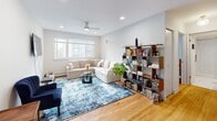 Located in Chicago's vibrant Lakeview neighborhood, this well-appointed 1-bedroom, 1-bathroom unit offers a thoughtfully designed single-floor layout. Warm hardwood flooring flows throughout the main living areas, complemented by clean white walls and recessed lighting that keep the space feeling bright and open.

The combined living and dining room serves as the heart of the unit, featuring a ceiling fan, large windows that invite natural light, and enough room to accommodate both a full seating arrangement and a dining area. A welcoming entrance with closet storage leads seamlessly into this central space.

The kitchen is sleek and functional, outfitted with white cabinetry, stainless steel appliances including a gas range, microwave, and refrigerator, and neutral large-format tile flooring — offering a clean, modern aesthetic.

The bedroom is comfortably sized with hardwood floors, a window with neighborhood views, recessed lighting, and notable closet storage including a full-width sliding-door closet. The space is practical and serene.

The bathroom features a contemporary design with glossy white tile flooring, a full-width glass-enclosed shower with white subway tile walls and built-in shelving, and a clean vanity. With five closets throughout, storage is a clear strength of this well-organized Lakeview unit.