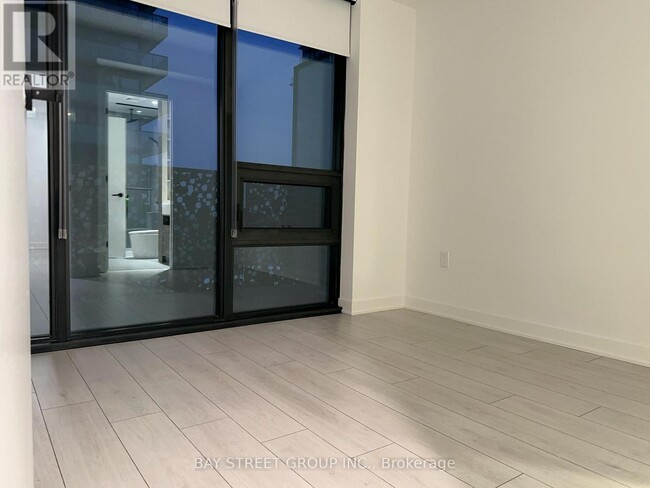 Building Photo - 55 Charles St E