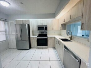 Building Photo - 571 SW 141st Ave