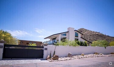 Building Photo - 5801 E Surrey Dr