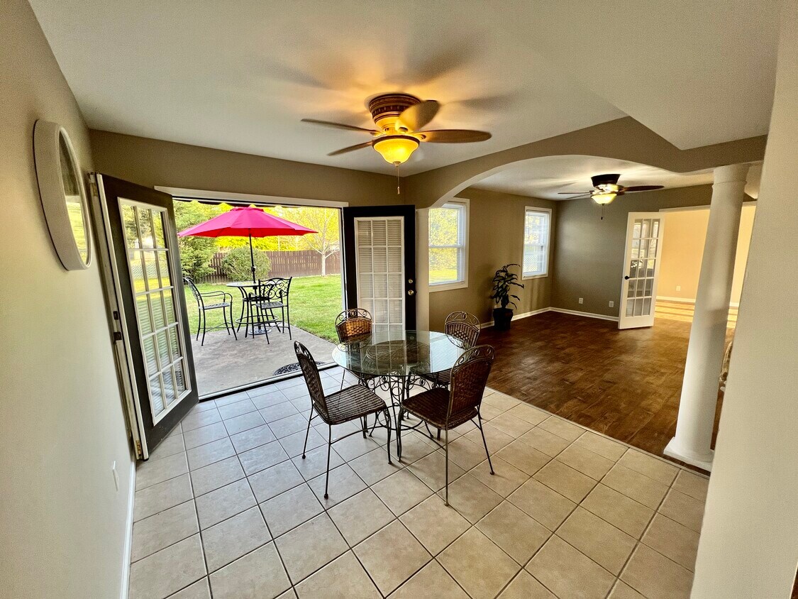 French doors off dining room leading to private fenced back yard - 8100 Sawyer Brown Rd