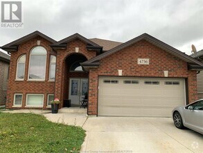 Building Photo - 4756 Periwinkle Crescent