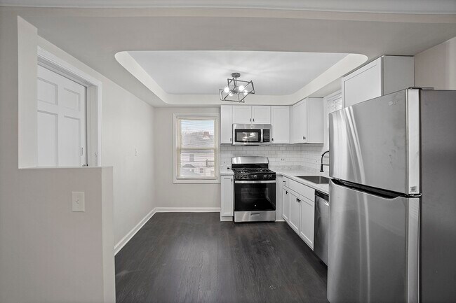 Building Photo - 13645 Cedar Road, Unit Up Unit