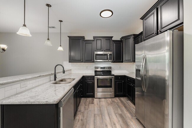 Foto del edificio - 407 E 3rd St