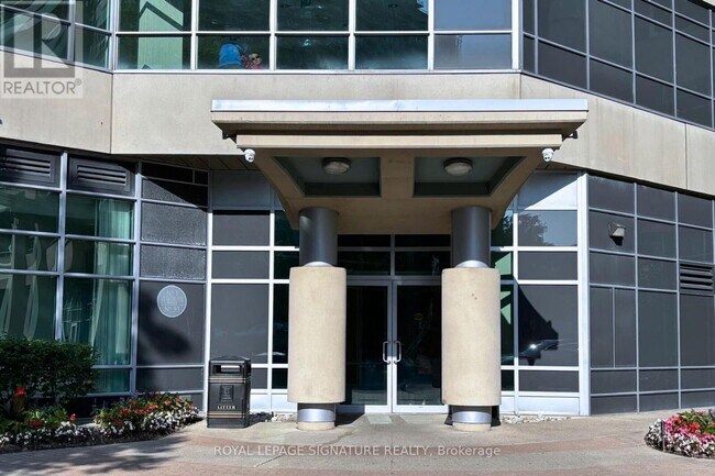 Photo du bâtiment - 1-1801 Elm Dr W