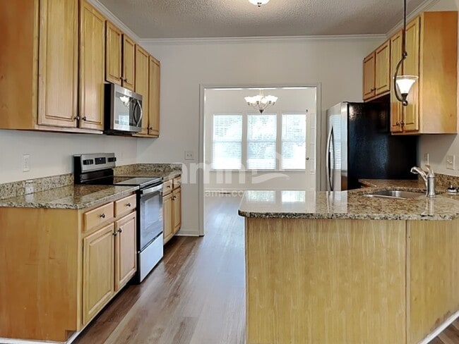 Foto del edificio - 8505 Rockcliff Rd