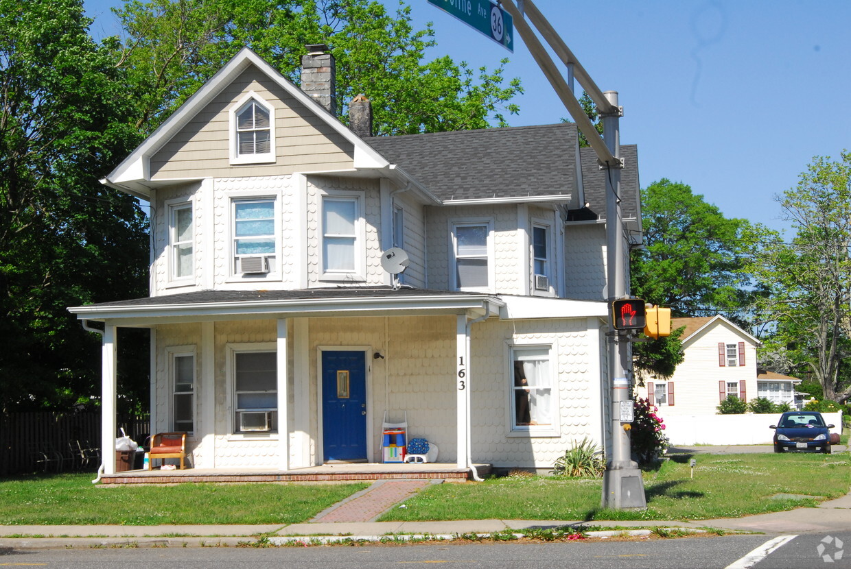 building is across the street - Gregory School Apartments