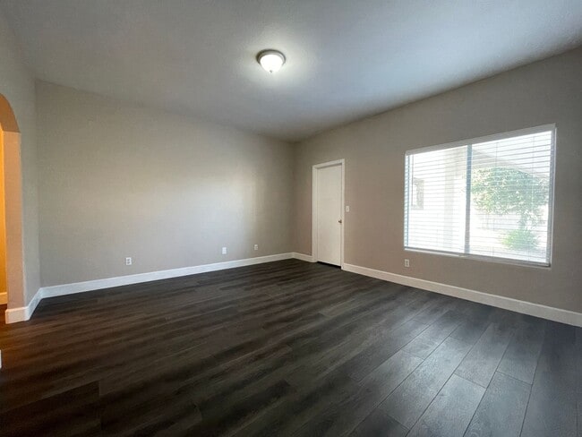 Building Photo - Beautifully remodeled first floor condo with attached 2 car garage!