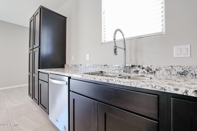 Building Photo - 8963 W Luke Ave