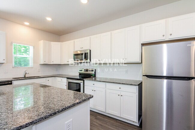 Building Photo - NEW Lower Rental Rate Leasing Special: Mar...