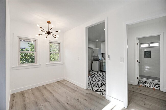 spacious living room and dining nook - 5347 Russell Ave