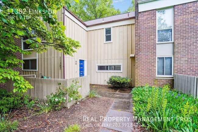 Photo - 11382 Links Dr Townhome