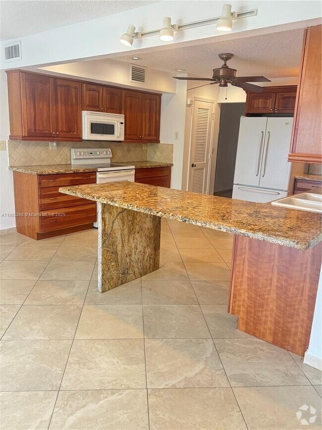 Building Photo - 3111 Coral Springs Dr