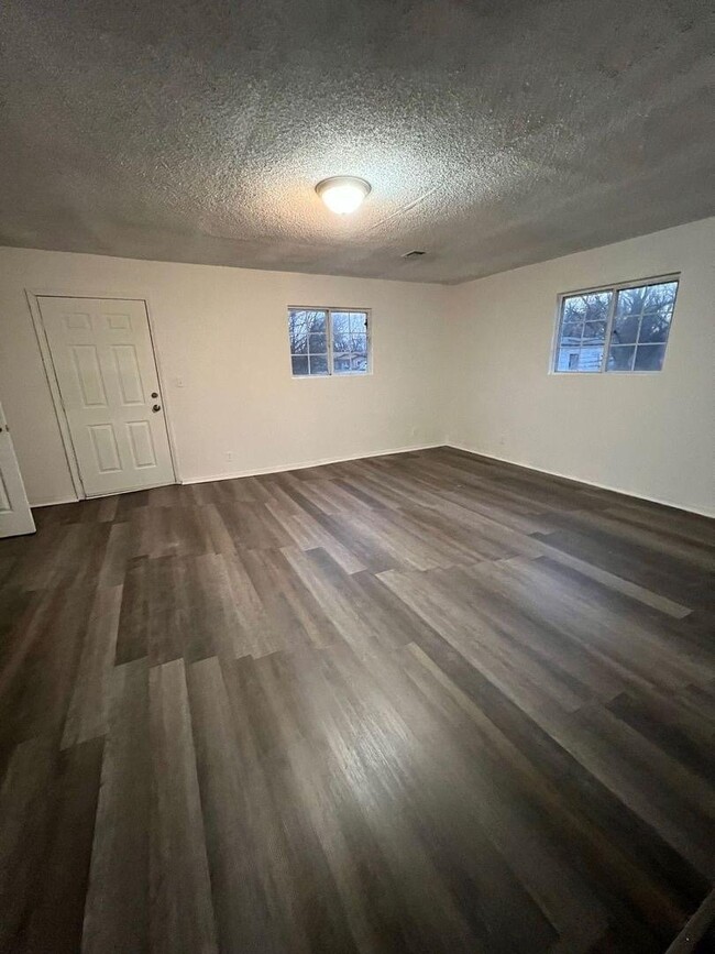 Building Photo - "COMING SOON-Spacious 4-Bed, 2-Bath Gem at...