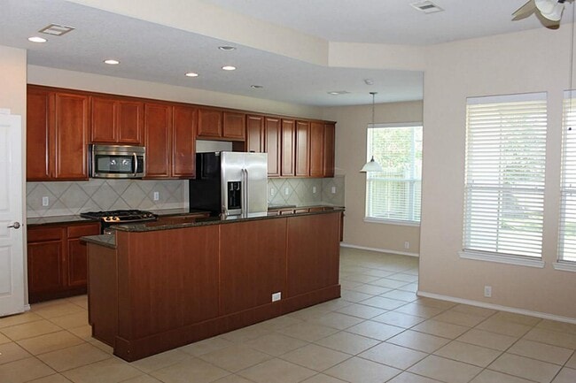 Building Photo - 9615 E Amber Bluff Ln