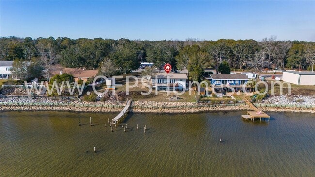 Building Photo - Stunning 4-Bedroom, 3-Bath Waterfront Home in Choctaw Beach – 140ft of Bayfront Bliss!