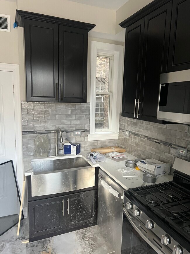 Building Photo - 1637 S Hamlin Ave
