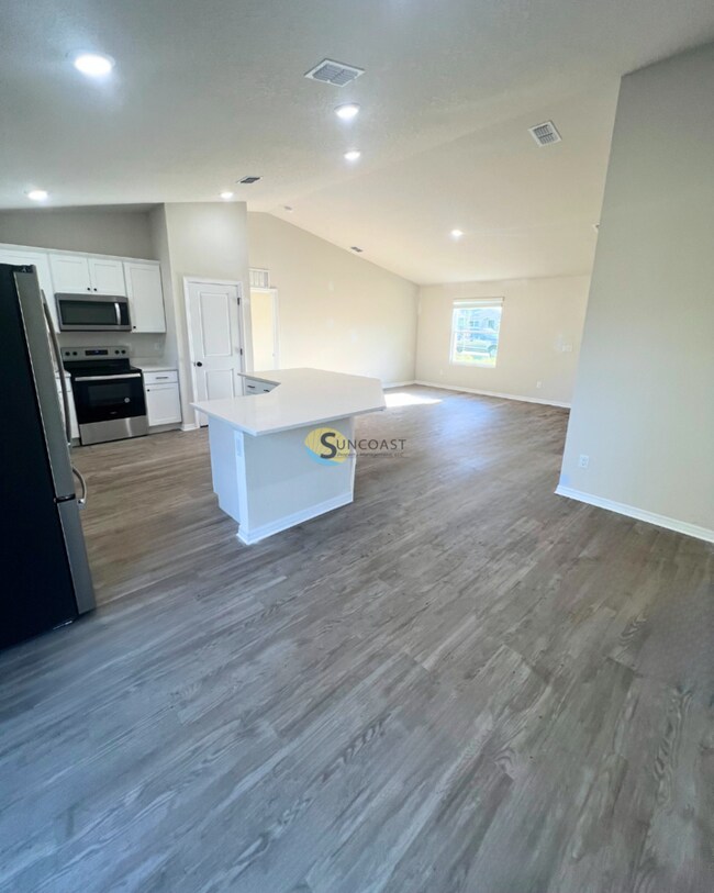 Building Photo - A New Look Arrives to Palm Coast!