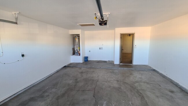 2 car garage with laundry machine space - 14414 Armando Silva Dr