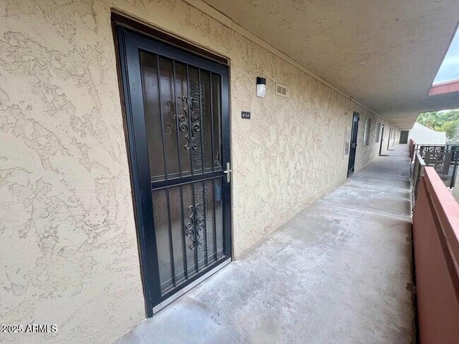 Building Photo - 7625 E Camelback Rd