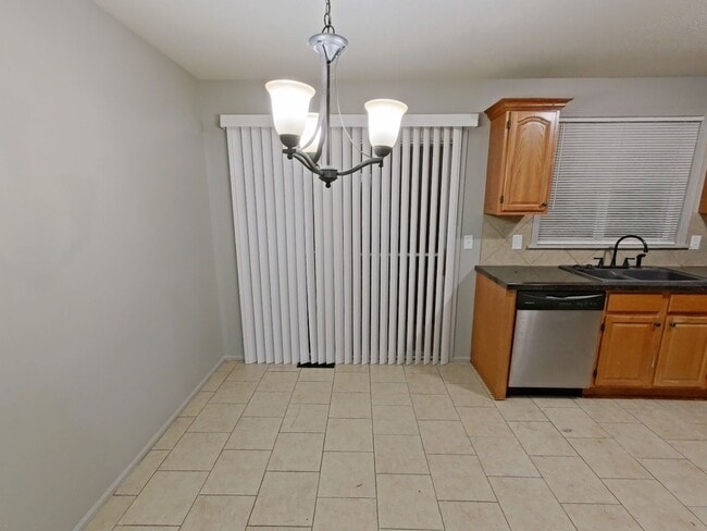 Building Photo - Lovely 3 bedroom/1.5 bath home with one car garage and finished basement.
