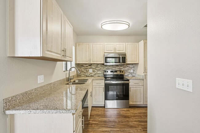 Cook, dine, and gather in a stylish kitchen space. - Indigo Creek