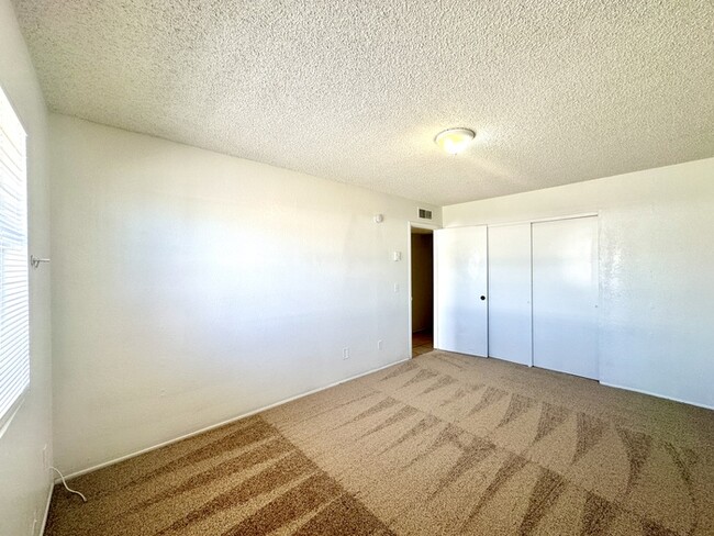 Building Photo - 2 Bedroom with Private Backyard! Off Stree...