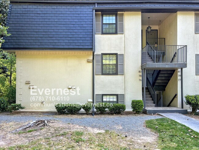 Foto del edificio - Cozy 1-Bedroom Apartment with Modern Ameni...