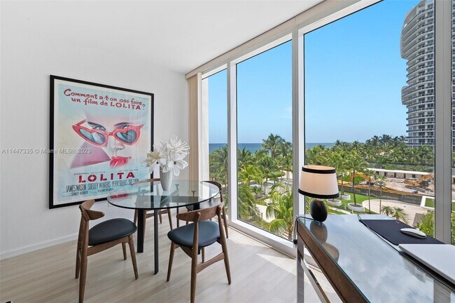 Building Photo - 10275 Collins Ave