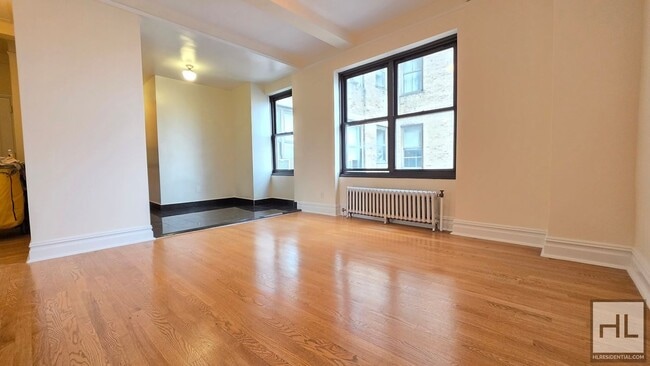 Building Photo - Sunlit 8th-Floor 1-Bed with Skyline Views in East Village