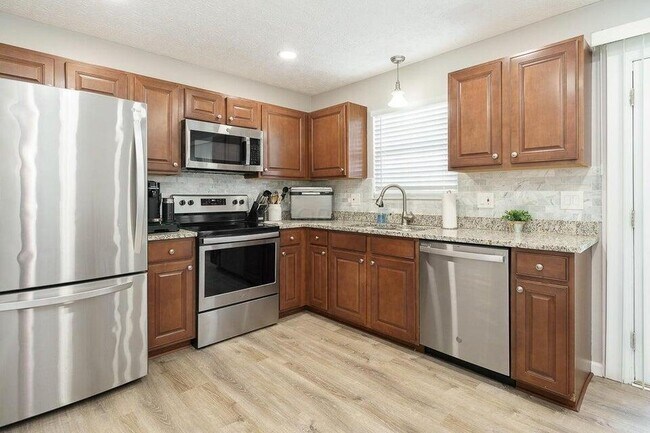 Building Photo - 7867 Meadowhaven Blvd