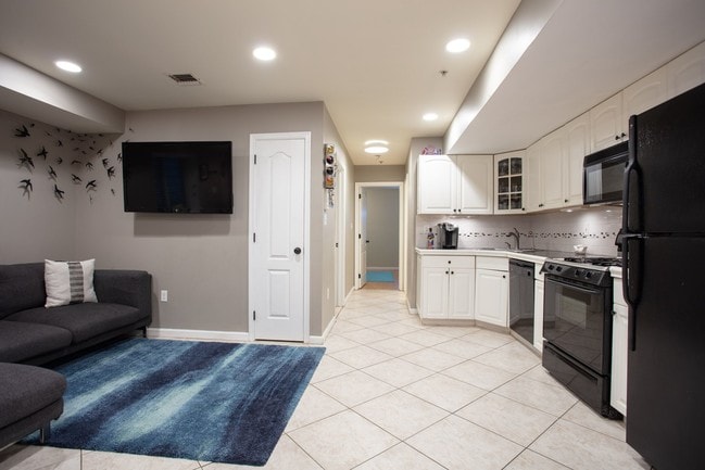 Living room with open kitchen 2 - 309 Manhattan Ave