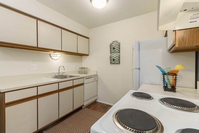 Spacious kitchen with various cabinets at Eastwood Village Apartments in Clinton Township, MI - Eastwood Village Apartments