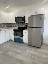 Building Photo - 880 NW 8th Ave