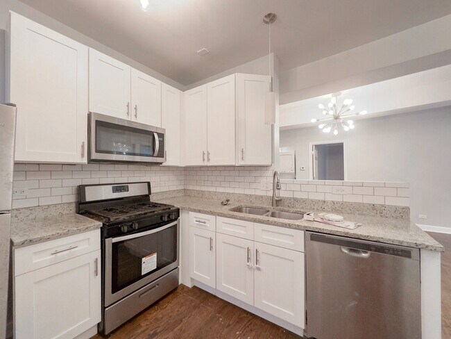 Building Photo - 303-3303 N Harding Ave