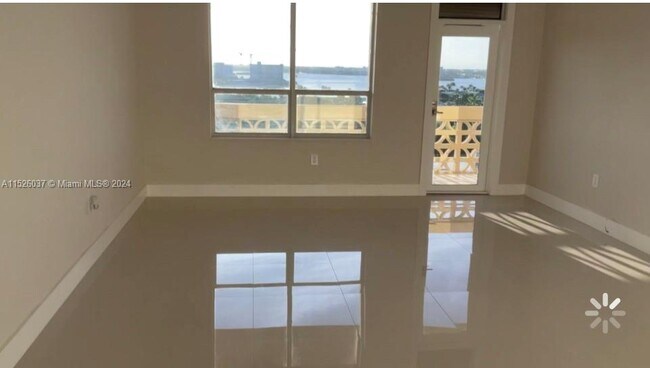 Building Photo - 10185 Collins Ave