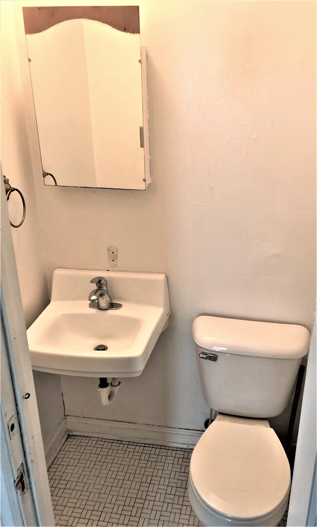 Half bath is downstairs, off of living/dining area. - 2231 N Gatewood Ave