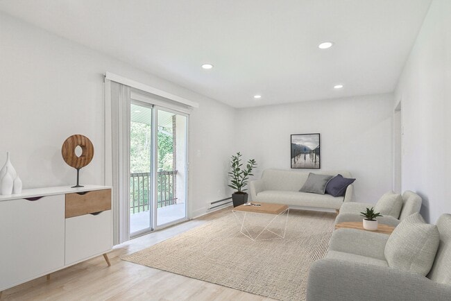 Living Room- Renovated - Jumping Brook Apartments