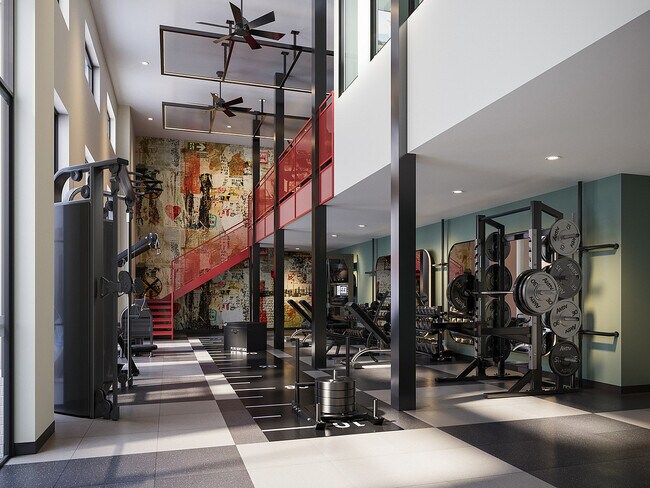 Gimnasio de dos plantas en los apartamentos Signature on Grand, cerca de UTK - Signature on Grand