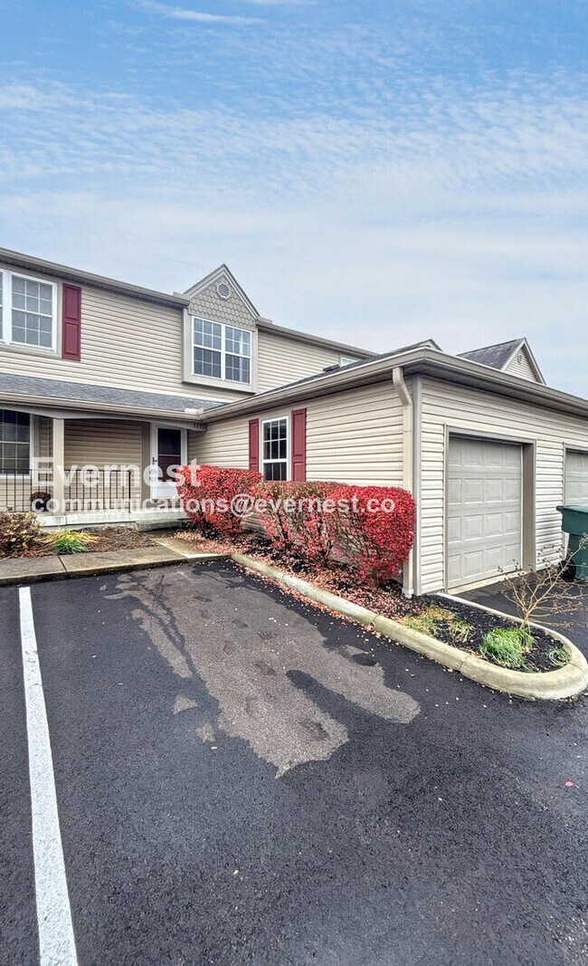 Foto del edificio - Spacious Condo with Modern Amenities and Garage Parking