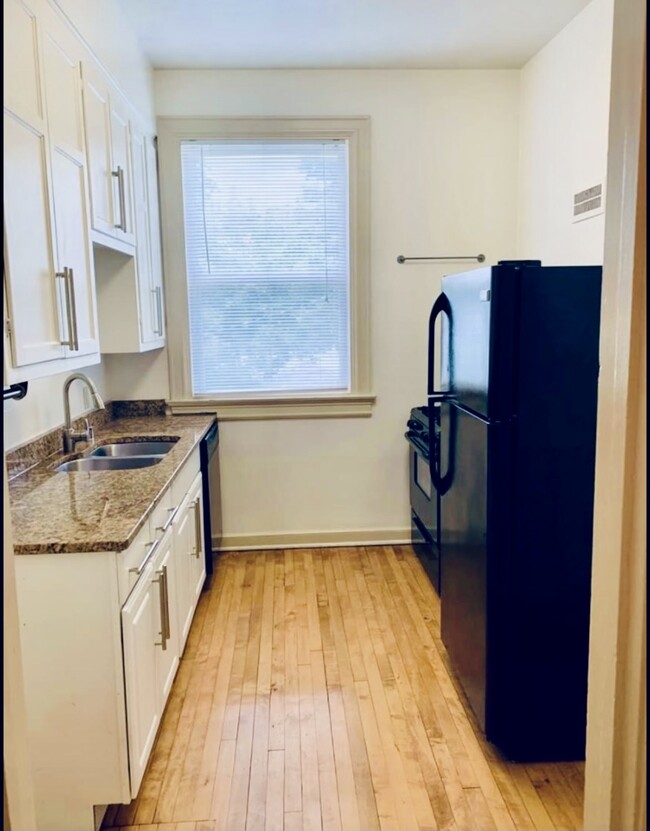 Building Photo - 2408 East Park Place, Unit 2412