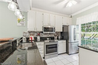 Building Photo - 8161 Twelve Oaks Cir