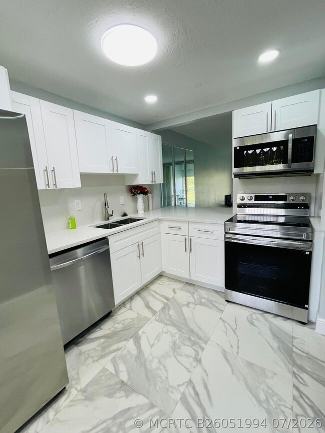 Building Photo - 5980 NW 64th Ave